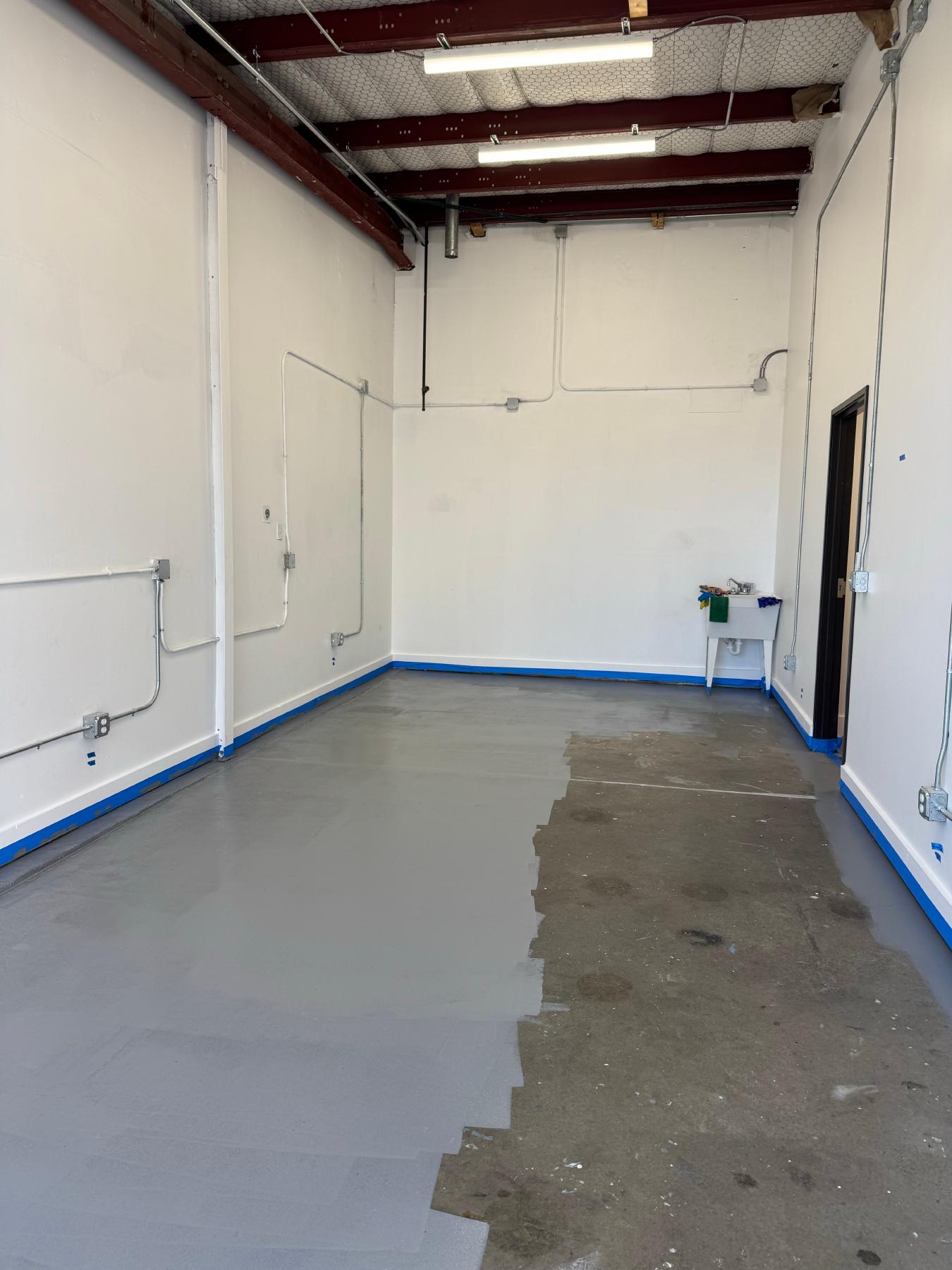 Workshop floor coating in progress